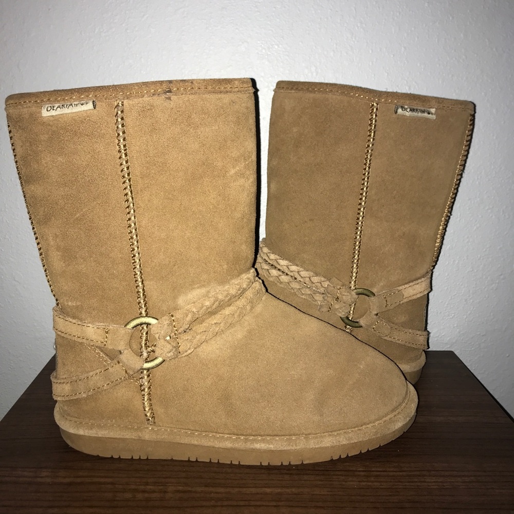 A pair of tan low bear paws